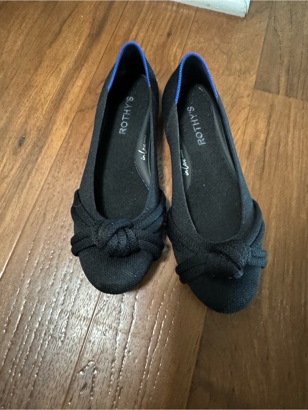 Rothy's Black Knot Ballet Flats with Blue Trim